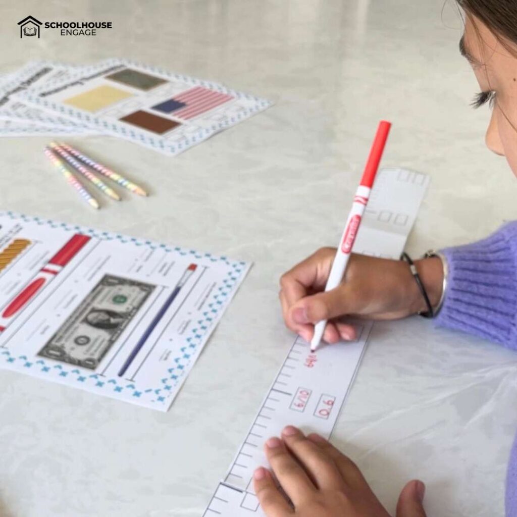 Student writing decimals on a DIY meter metric measuring tape 