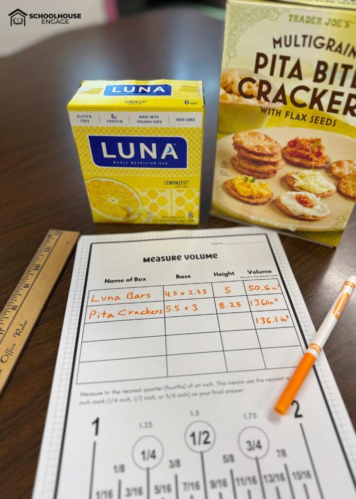 Measuring Volume using boxes recording sheet with ruler and pen