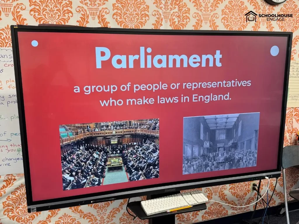 Causes of American Revolution Vocabulary Slides. The image is of an English Parliament in a classroom.